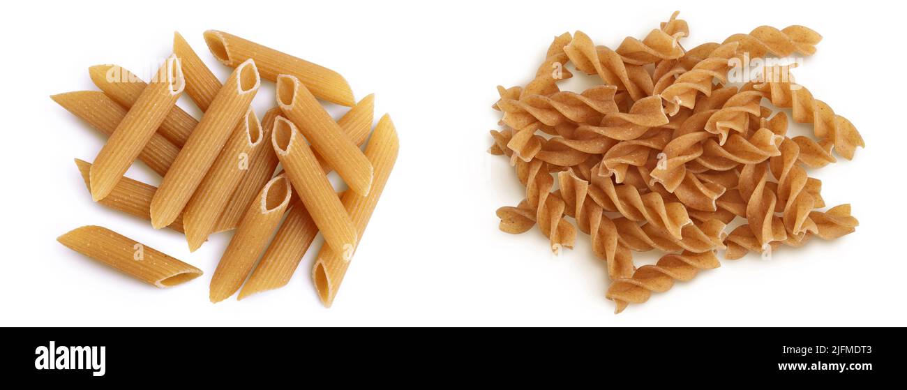 Wolegrain penne and fusilli pasta from durum wheat isolated on white background. Top view. Flat lay, Stock Photo