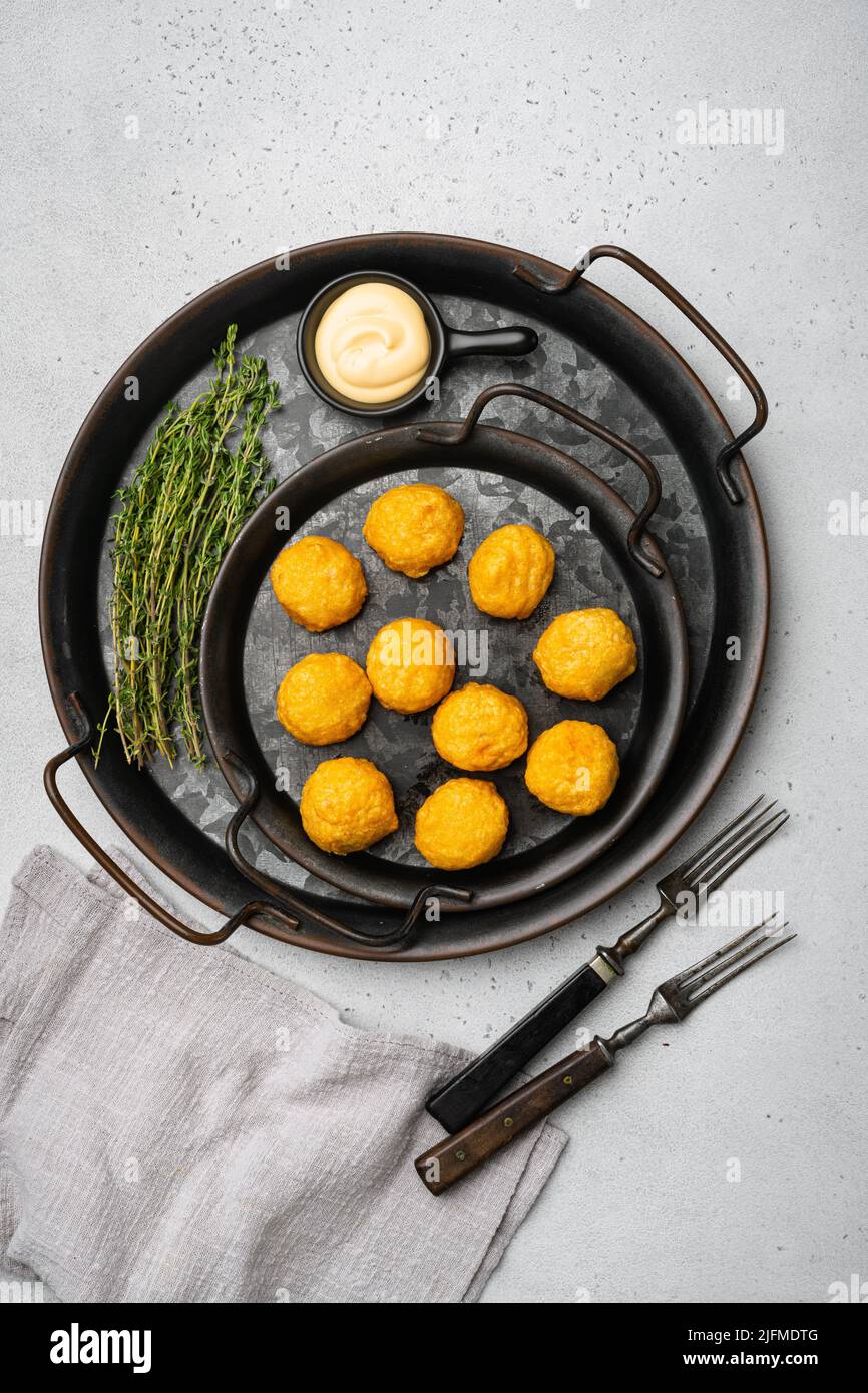 Breaded chicken fillet and batter on gray stone table background, top ...