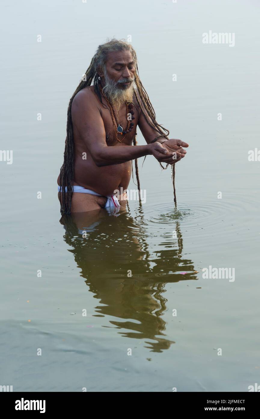 Rome baba bathing in the Ganges River at sunrise, For Editorial Use Only, Allahabad Kumbh Mela, World’s largest religious gathering, Uttar Pradesh, In Stock Photo