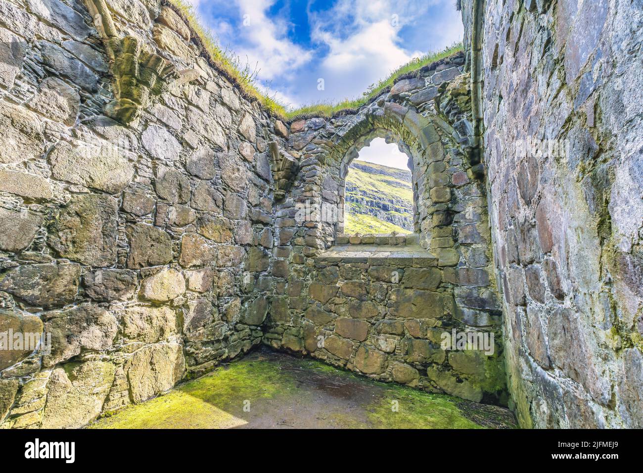 Ruins of the medieval Magnus cathedral in Kirkjubour ON the Faroe Islands Stock Photo