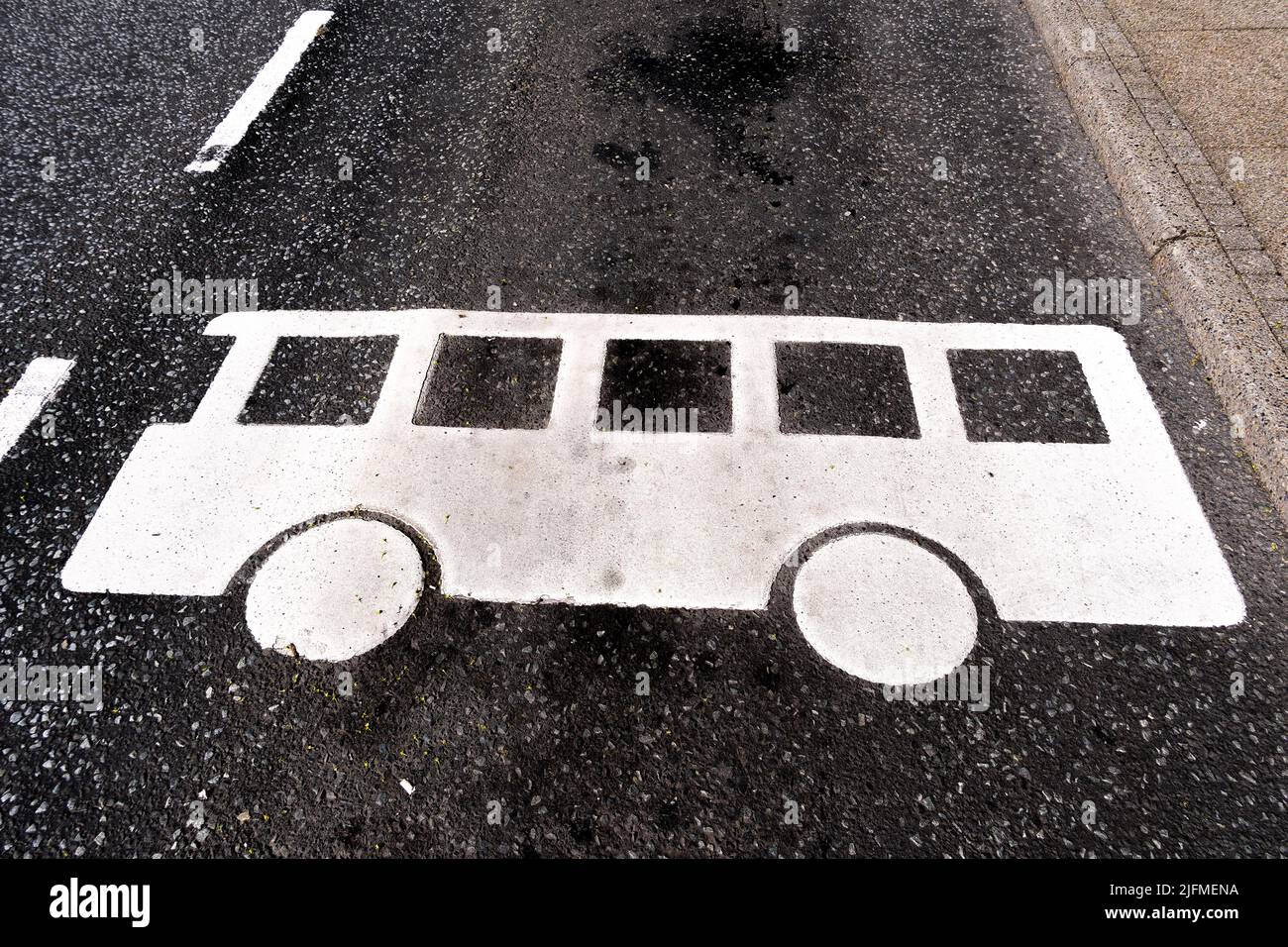 Street sign marking a lane for busses Stock Photo
