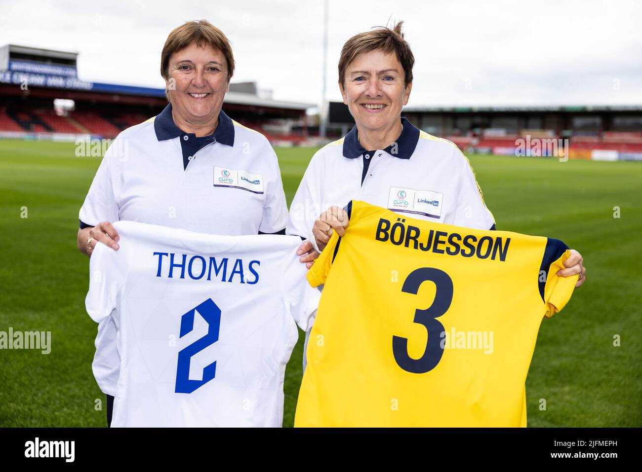 EDITORIAL USE ONLY The first woman to captain the England football team at the first UEFA Women's EUROs, Carol Thomas, and former football Sweden football captain, Anette Borjesson at Mornflake Stadium in Crewe, the site of the first ever women's EUROs match in 1984, ahead of UEFA Women's EURO 2022 tournament. Picture date: Monday July 4, 2022. Stock Photo