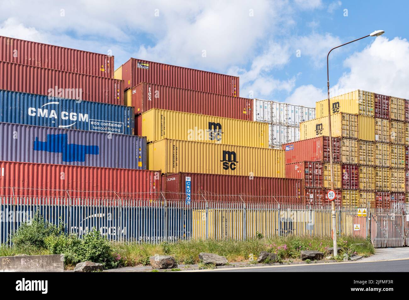 Shipping containers stacked at Dublin Port, Dublin, Ireland Stock Photo