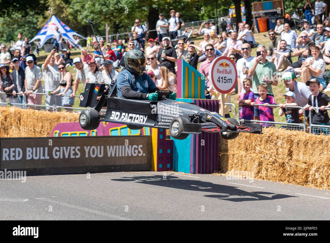 Team 3D Factory kart taking the final jump at the Red Bull Soapbox race