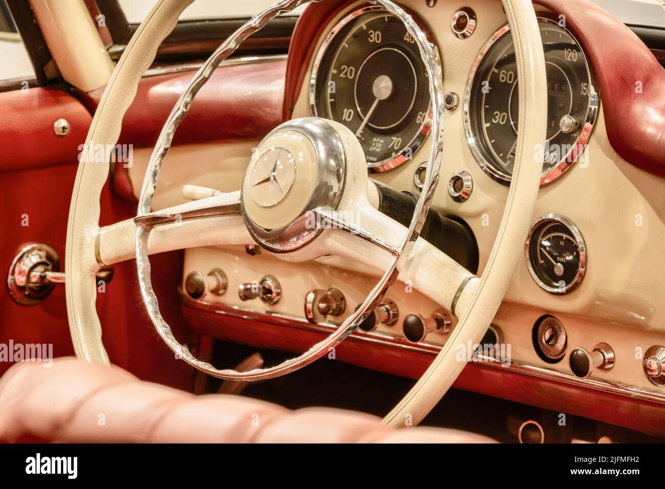 Essen, Germany - March 23, 2022: Interior of a classic red Mercedes 300 SL convertible car in Essen, Germany Stock Photo
