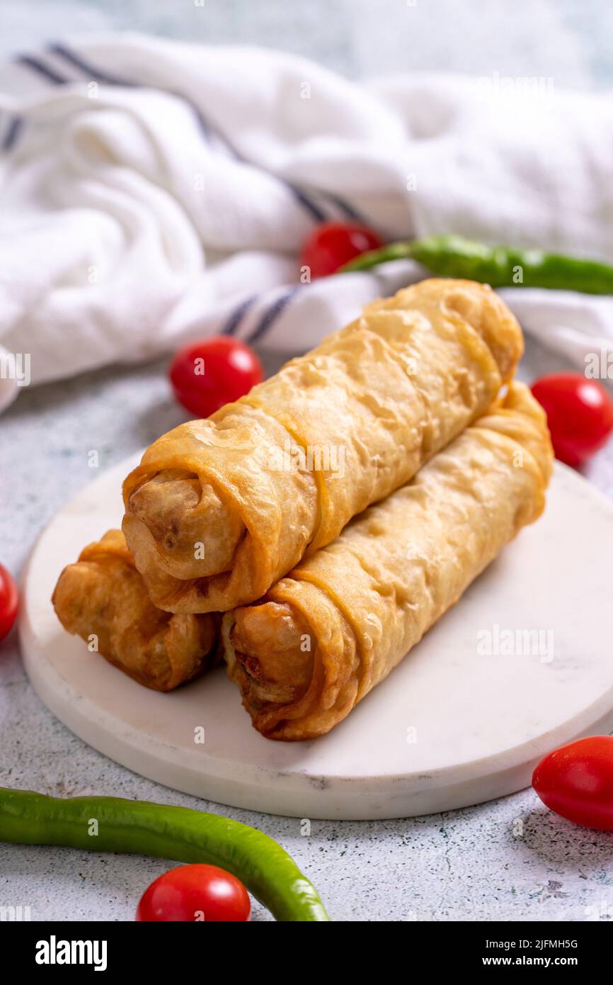 Pacanga pastry. Turkish Pacanga Boregi with pastirma (pastrami) and