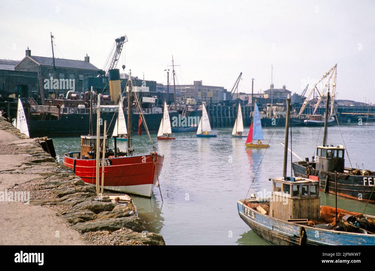 Boats in the harbour, Folkestone, Kent, England, UK early 1960s Stock Photo