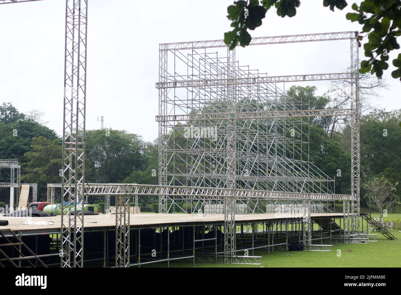 Different parts of metal scaffold on the construction field. Workers