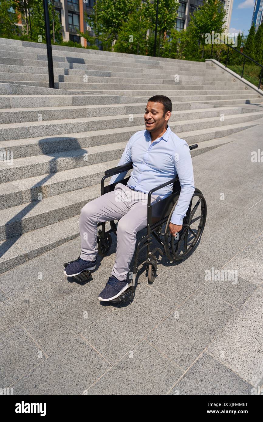 Wheelchair down stairs hi-res stock photography and images - Alamy