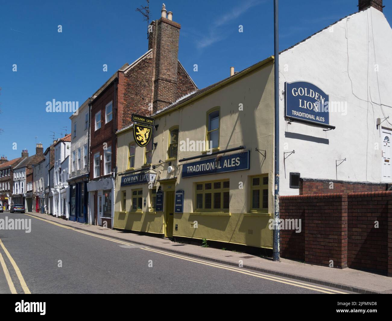 View along High Street Boston Lincolnshire England UK with the Golden Lion next to numerous preserved historic buildings Stock Photo