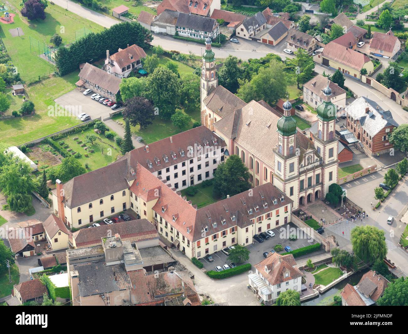AERIAL VIEW. Abbey Church of St. Mauritius in Ebersmunster. Bas-Rhin, Alsace, Grand Est, France. Stock Photo