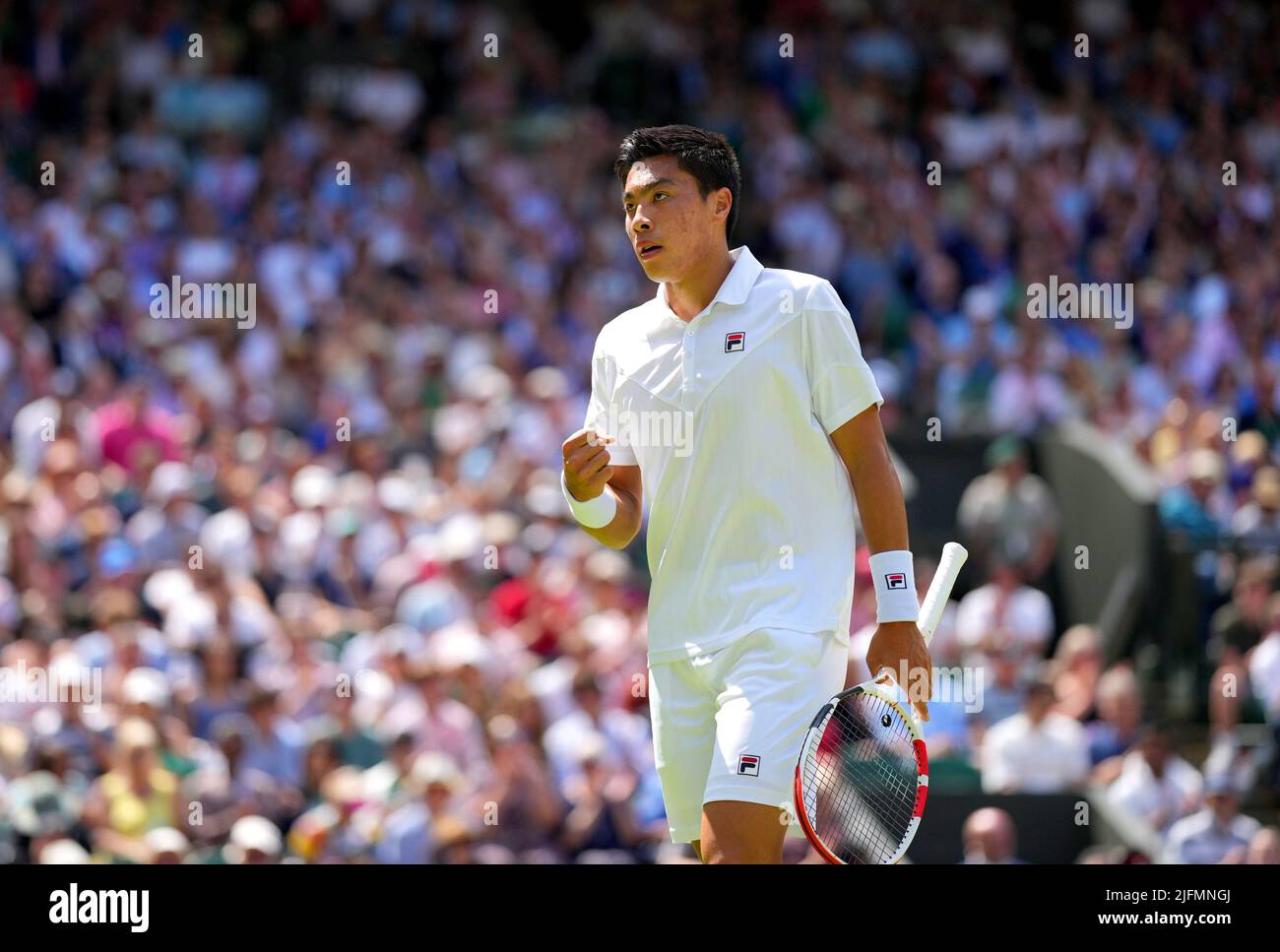 Brandon Nakashima reacts during his Gentlemen's singles fourth round match against Nick Kyrgios on centre court on day eight of the 2022 Wimbledon Championships at the All England Lawn Tennis and Croquet Club, Wimbledon. Picture date: Monday July 4, 2022. Stock Photo