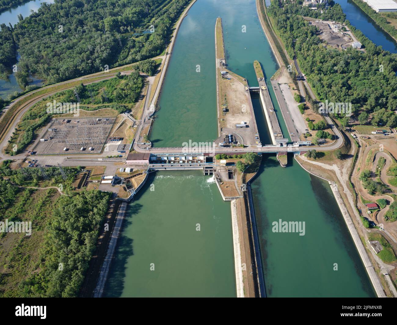 AERIAL VIEW. Power generating station and lock on the Canal d'Alsace. Strasbourg, Bas-Rhin, Alsace, Grand Est, France. Stock Photo