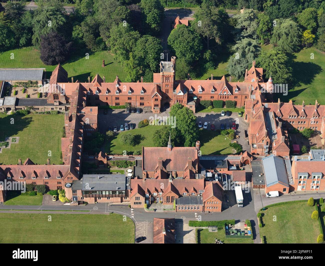 AERIAL VIEW. Girton College, University of Cambridge, Cambridgeshire, England, United Kingdom. Stock Photo