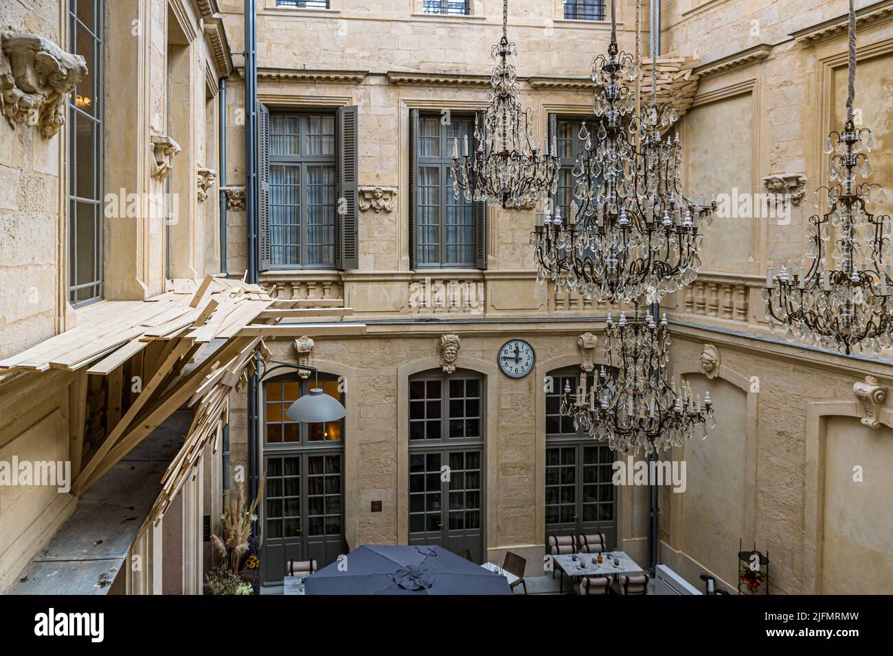 In the courtyard of the Hotel Richer de Belleval, Japanese artist Tadashi Kawamata displays 'Birds' Nests' made of wooden slats. Montpellier, France Stock Photo