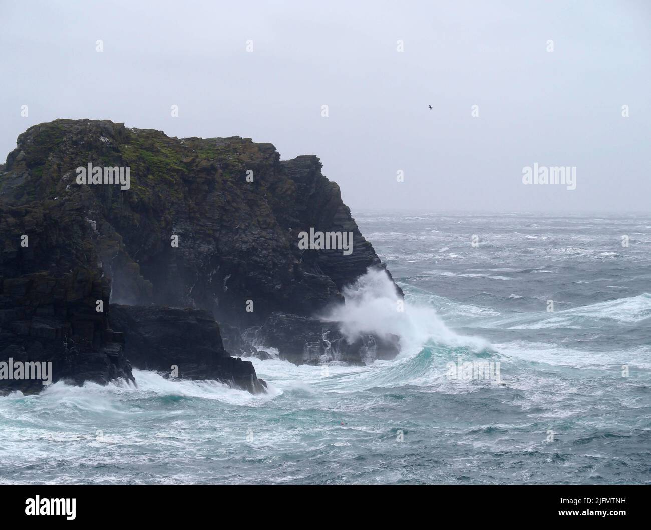 Waves breaking on Burroo, calf of Man, Isle of Man Stock Photo