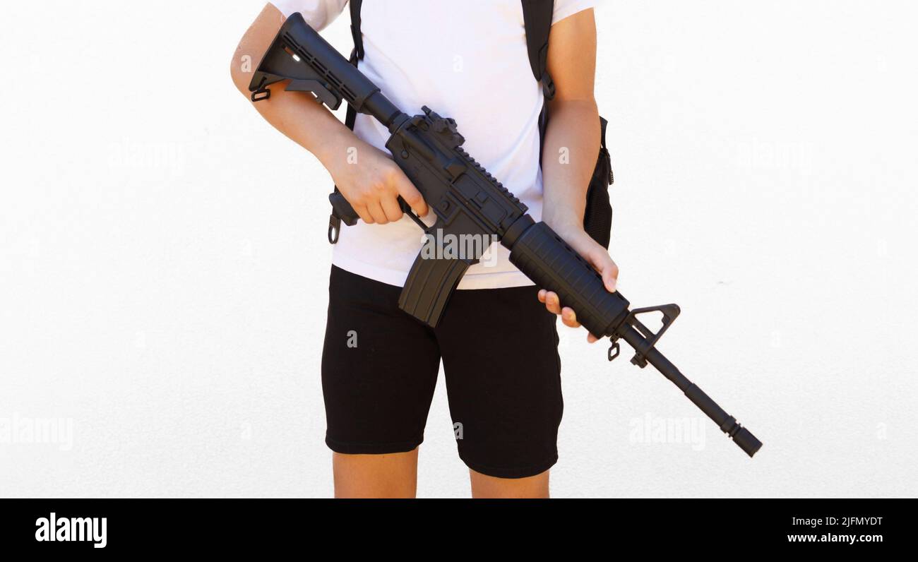Caucasian gunman holding his rifle- Copenhagen mall attack concept. Stock Photo