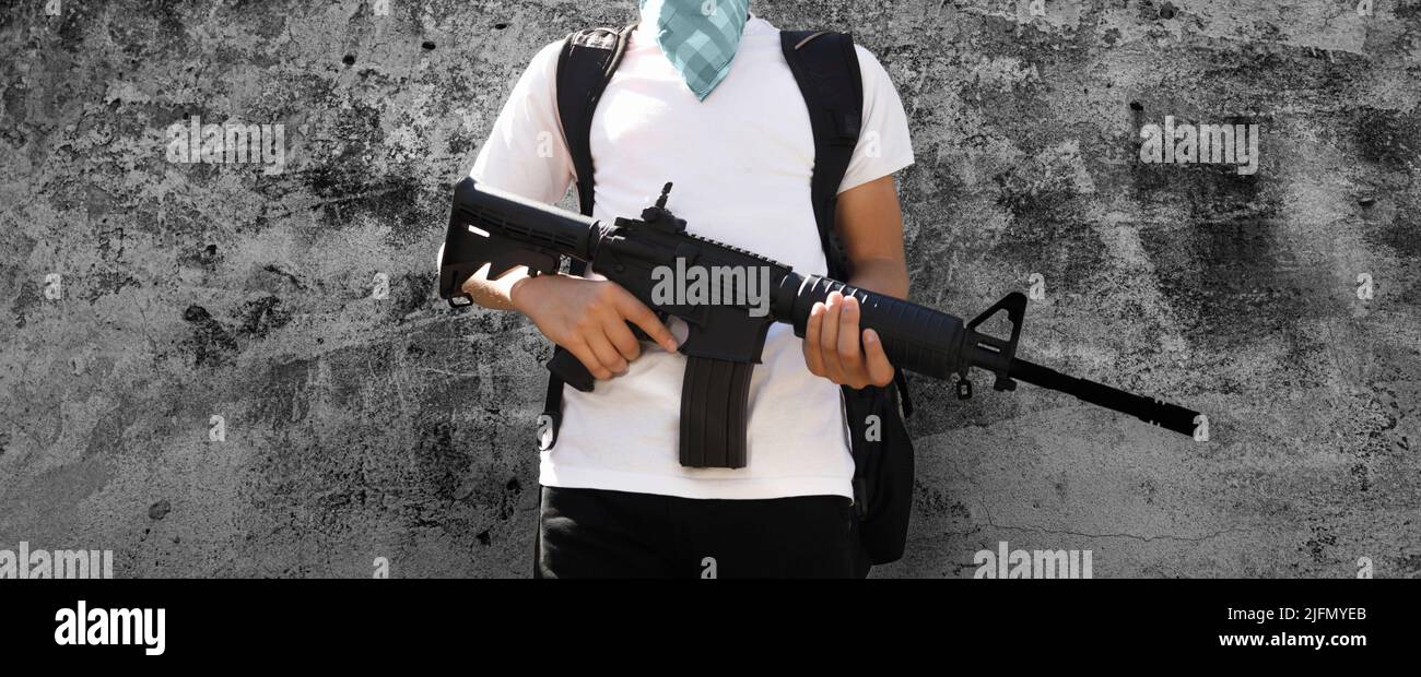 Caucasian man holding an automatic rifle. Copenhagen mall attack concept. Stock Photo