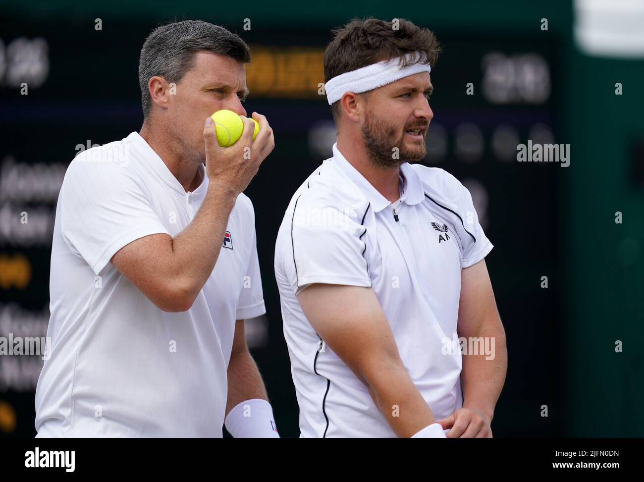 Jonny O'Mara (right) and Ken Skupski during their match against Kevin  Krawietz and Andreas Mies on day eight of the 2022 Wimbledon Championships  at the All England Lawn Tennis and Croquet Club,