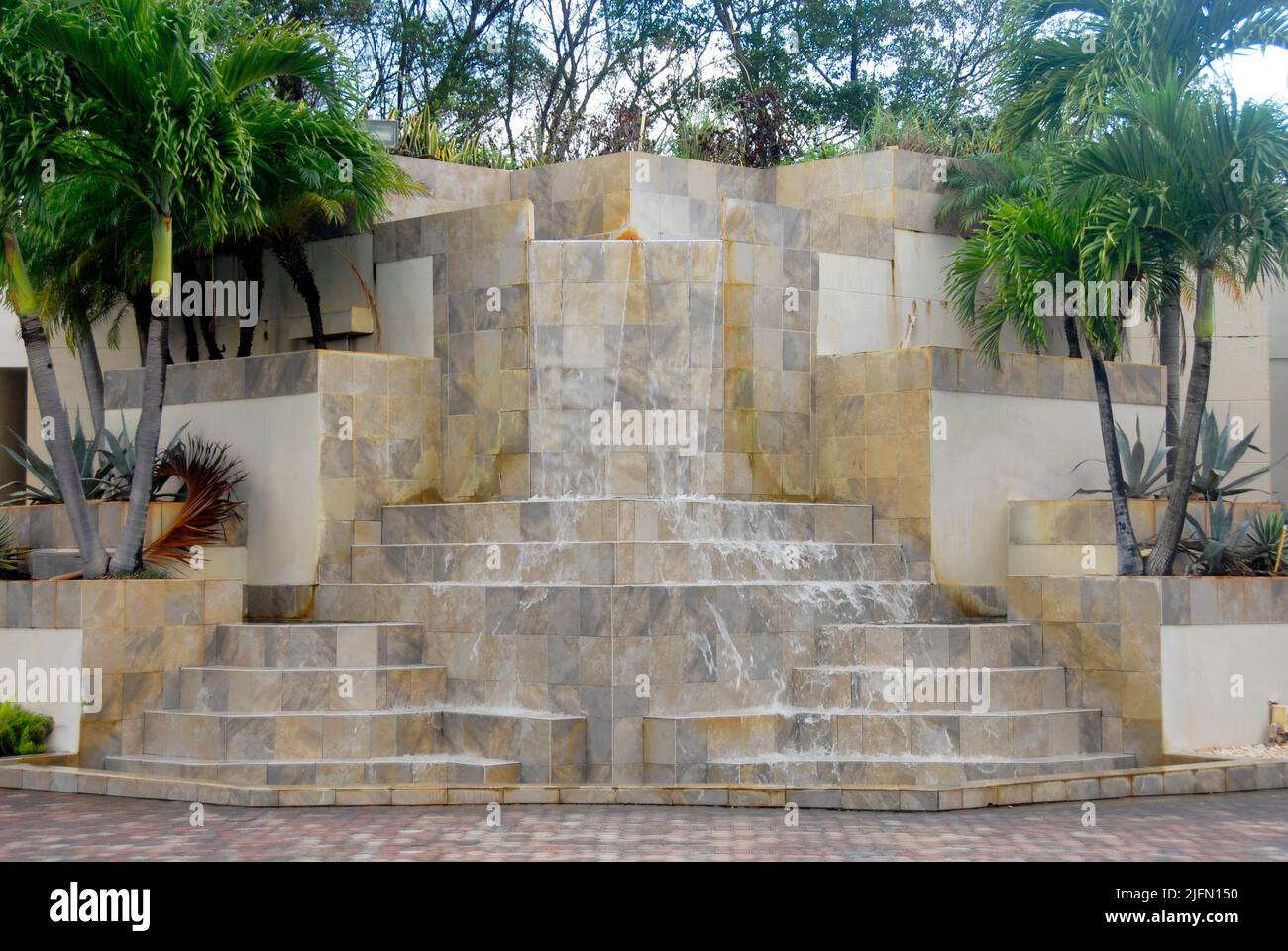 Large ornamental waterfall in grounds of a hotel, Miami, Florida, USA Stock Photo