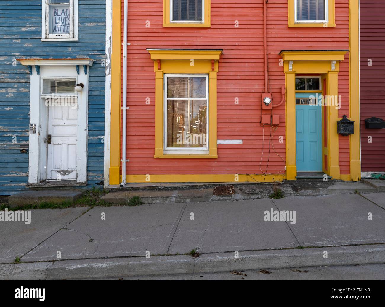 Entrance to a colorful St. John’s rowhouse, commonly called a jelly bean house Stock Photo