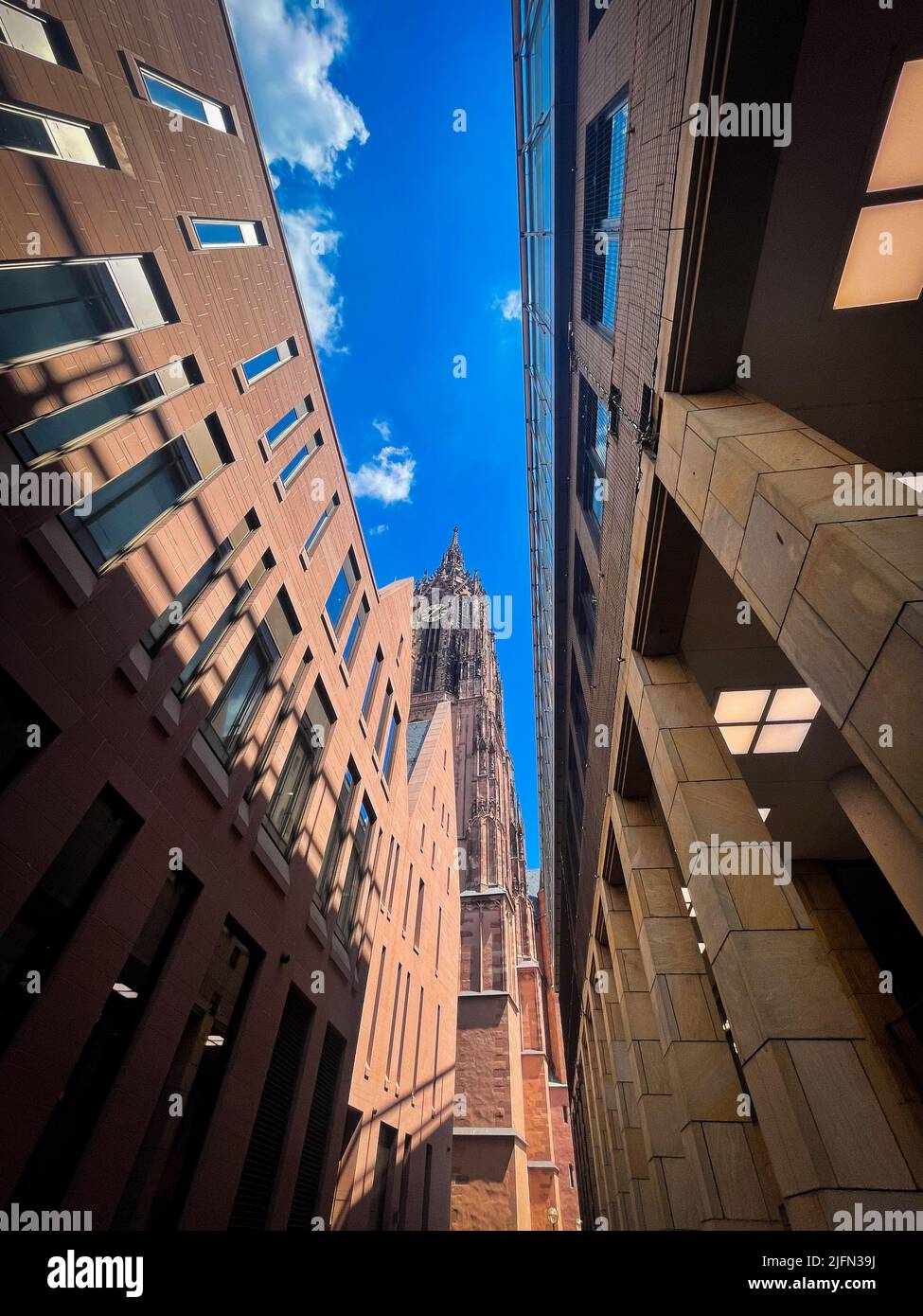 The historic Frankfurt Cathedral in Frankfurt am Main against a clear blue sky Stock Photo
