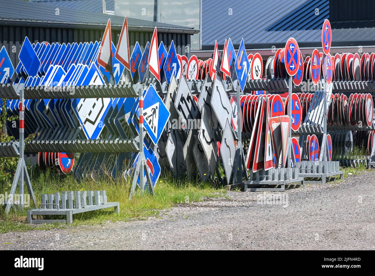 Storage place for European road traffic signs on an outdoor area, selected focus, narrow depth of field Stock Photo