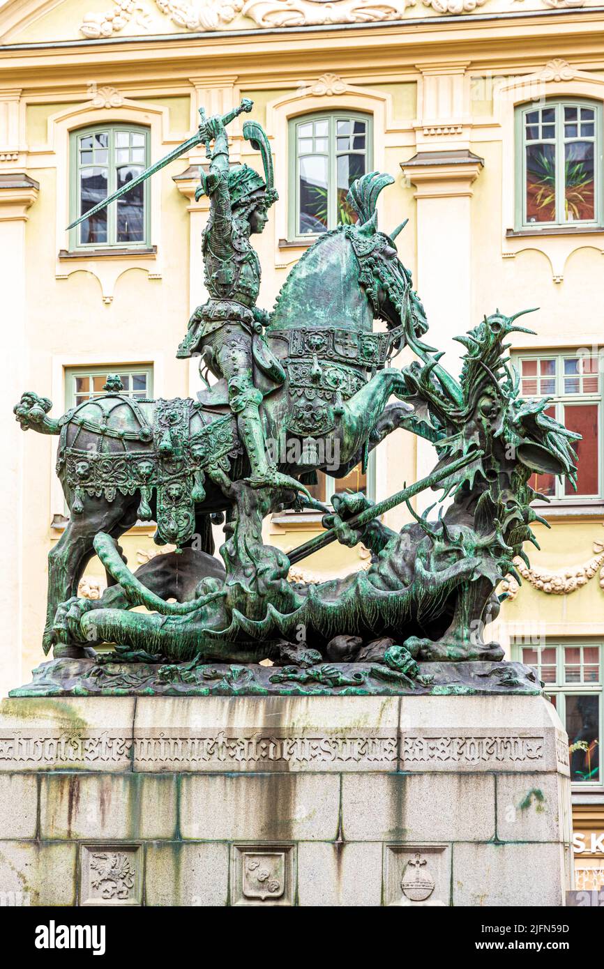 A statue of St George and the Dragon in Kopmantorget, Gamla Stan (the old town) in Stockholm, Sweden Stock Photo