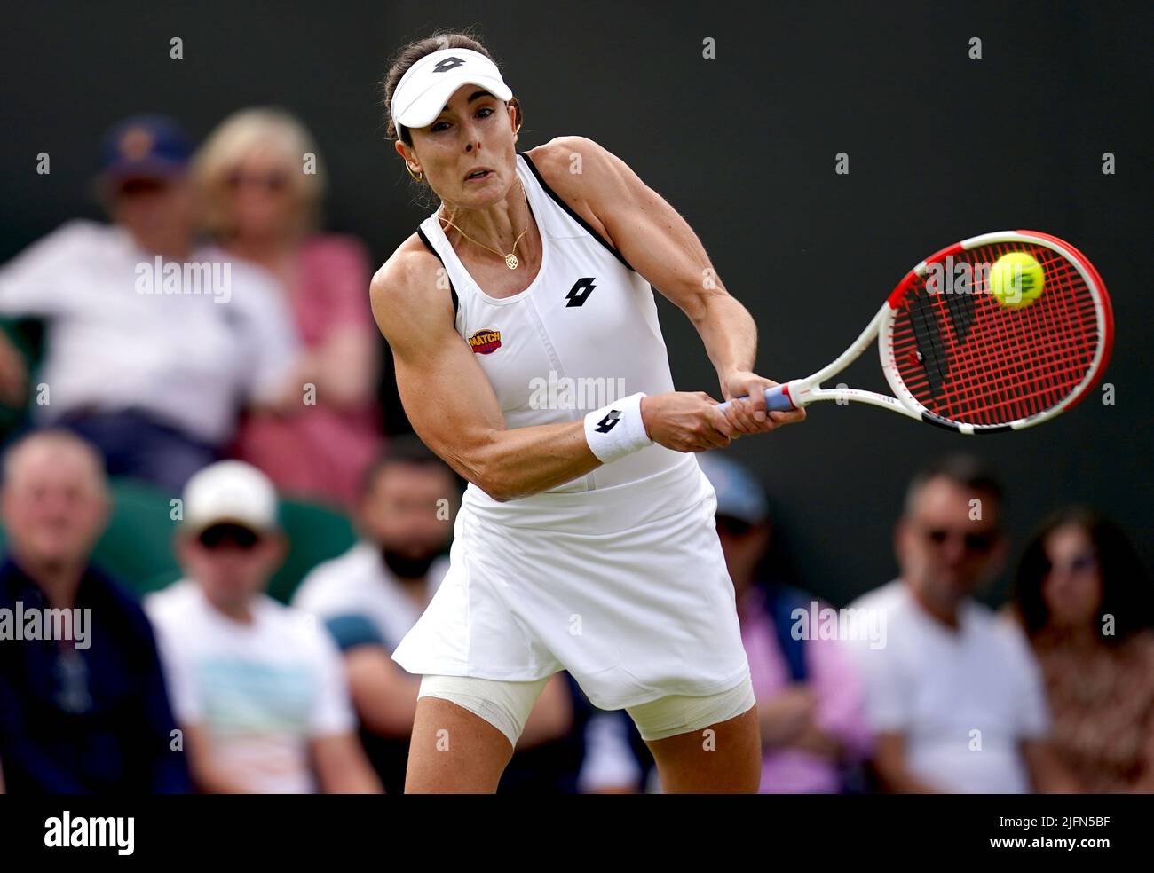 Alize in action against Ajla Tomljanovic on day eight of the 2022 Wimbledon Championships