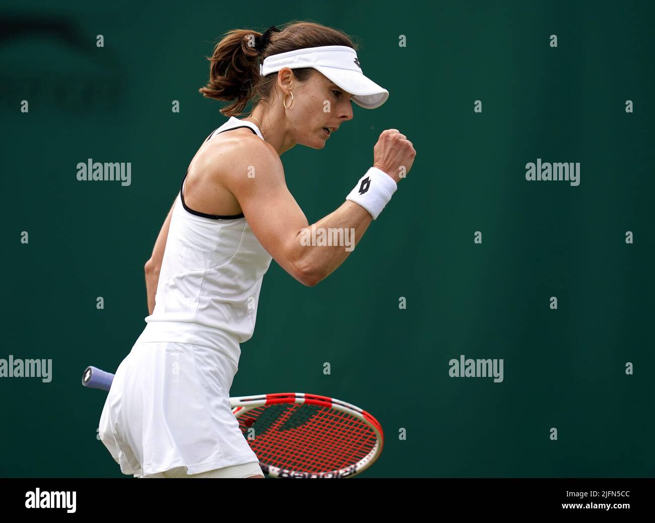 Alize reacts action against Ajla Tomljanovic on day eight of the