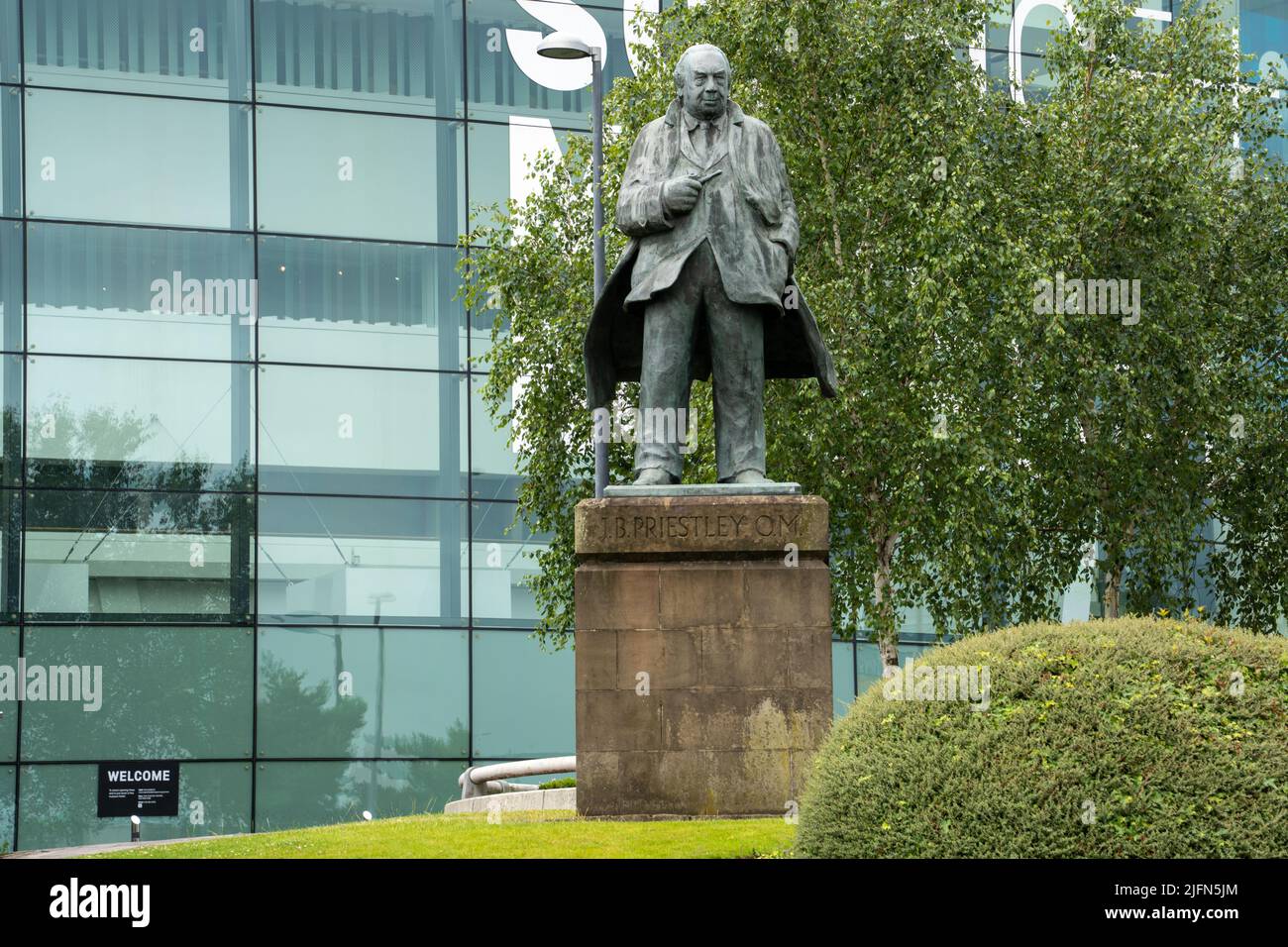 Statue of the British writer J.B. Priestley outside of the National Science and Media Museum in Bradford, UK. Stock Photo