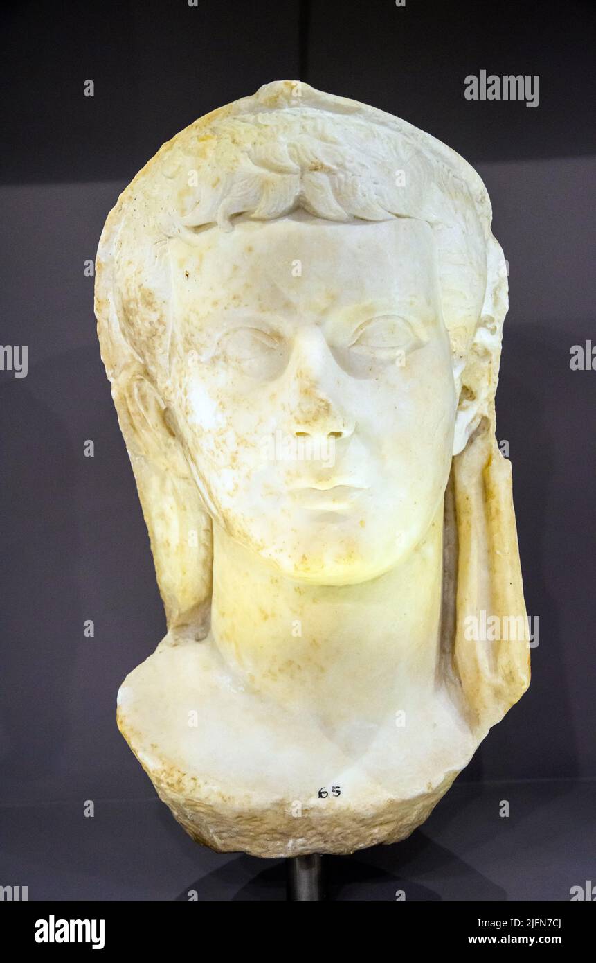 Marble portrait over life-size of emperor Tiberius (Tiberius Julius Caesar, 14-37 AD). The head is covered by a toga (velatio capitis). The carving of Stock Photo