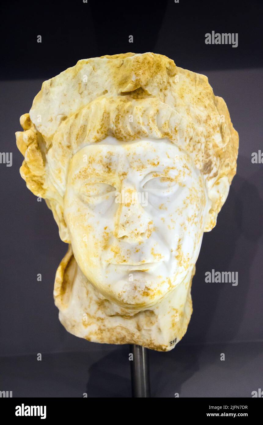 Marble portrait of emperor Traianus (Marcus Ulpius Nerva Trajanus, 98-117 AD). He is crowned with a laurel wreath, a remembrance of his military succe Stock Photo