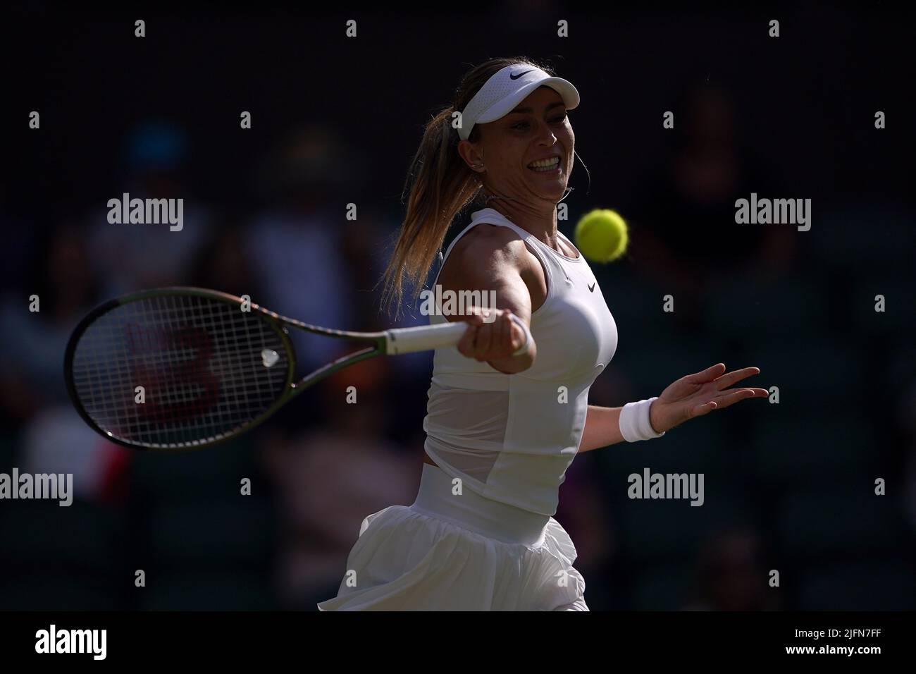 Paula Badosa in action during their Ladies' Singles fourth round match against Simona Halep on day eight of the 2022 Wimbledon Championships at the All England Lawn Tennis and Croquet Club, Wimbledon. Picture date: Monday July 4, 2022. Stock Photo
