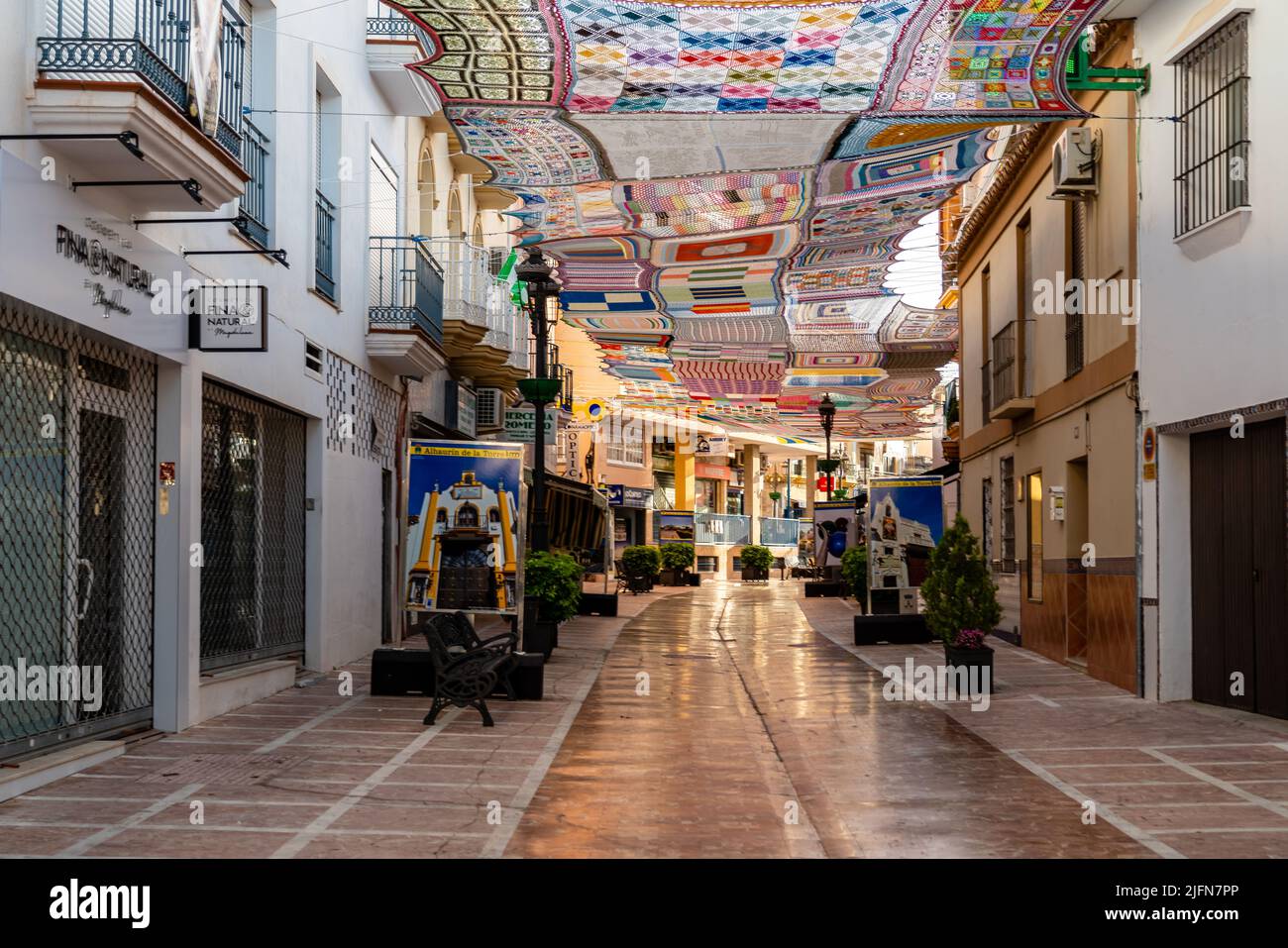 Alhaurin de la Torre, Spain - July 01 2022: Famous Street Malaga, in the centere of the city decorated with coloured shade tents. This European city i Stock Photo
