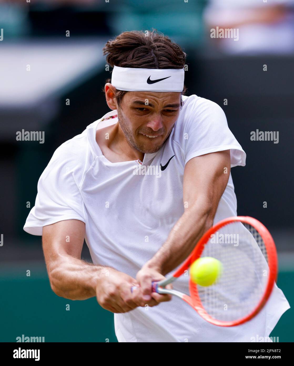 Taylor Fritz in action on day eight of the 2022 Wimbledon Championships