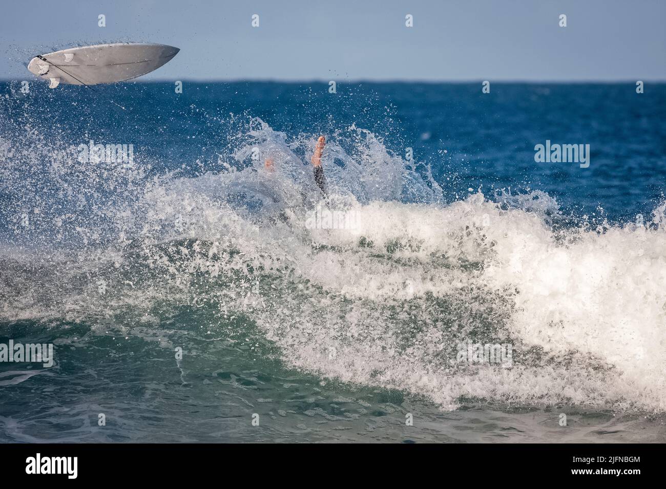 Wreck Point Surfing A surfer riding a point break waves and being wipeout in Jeffreys Bay ...
