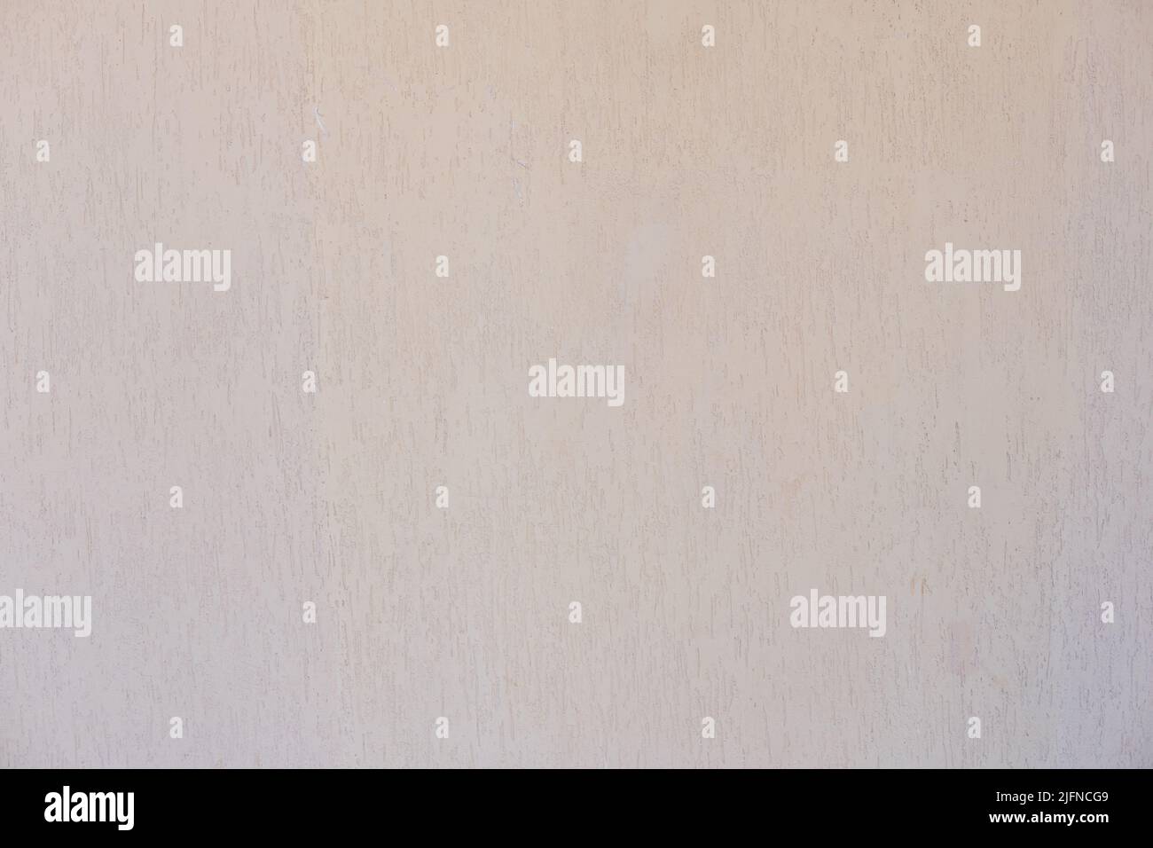 Textured wall lined with shell rock tiles. Stock Photo