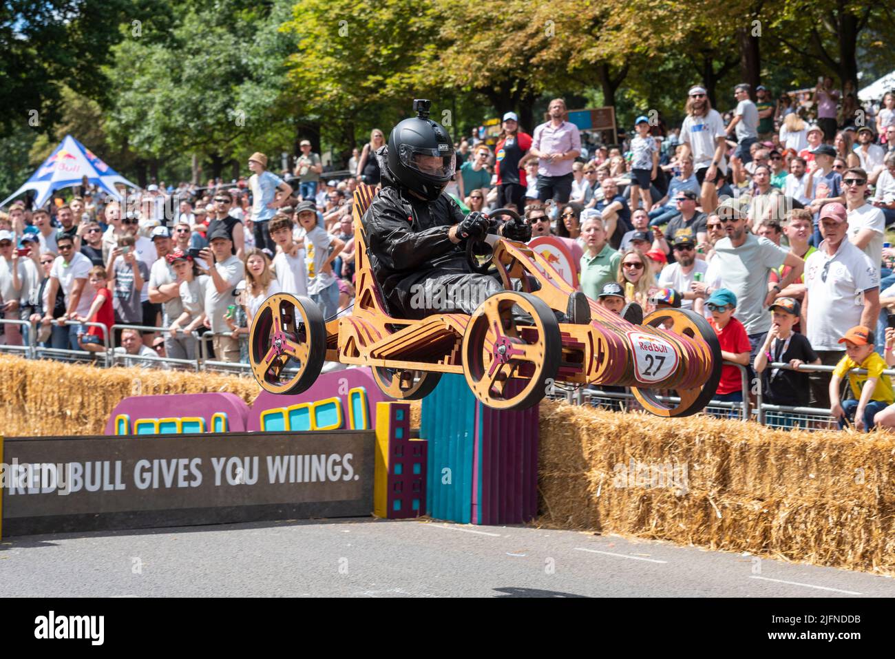 Team Organised Chaos kart taking the final jump at the Red Bull Soapbox race 2022 at Alexandra Palace in London, UK. Stock Photo