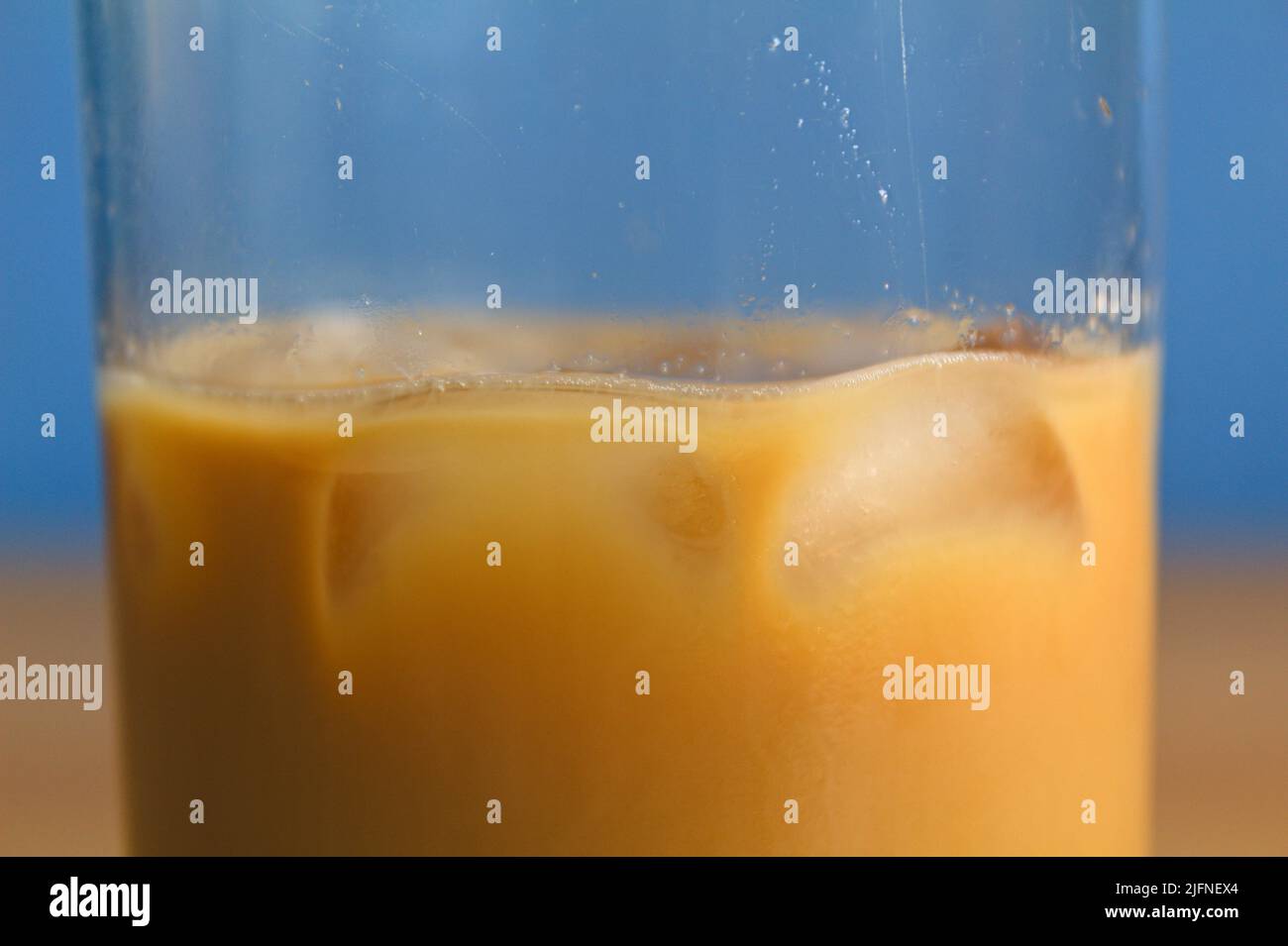melting ice cubes in glass of iced coffee Stock Photo Alamy