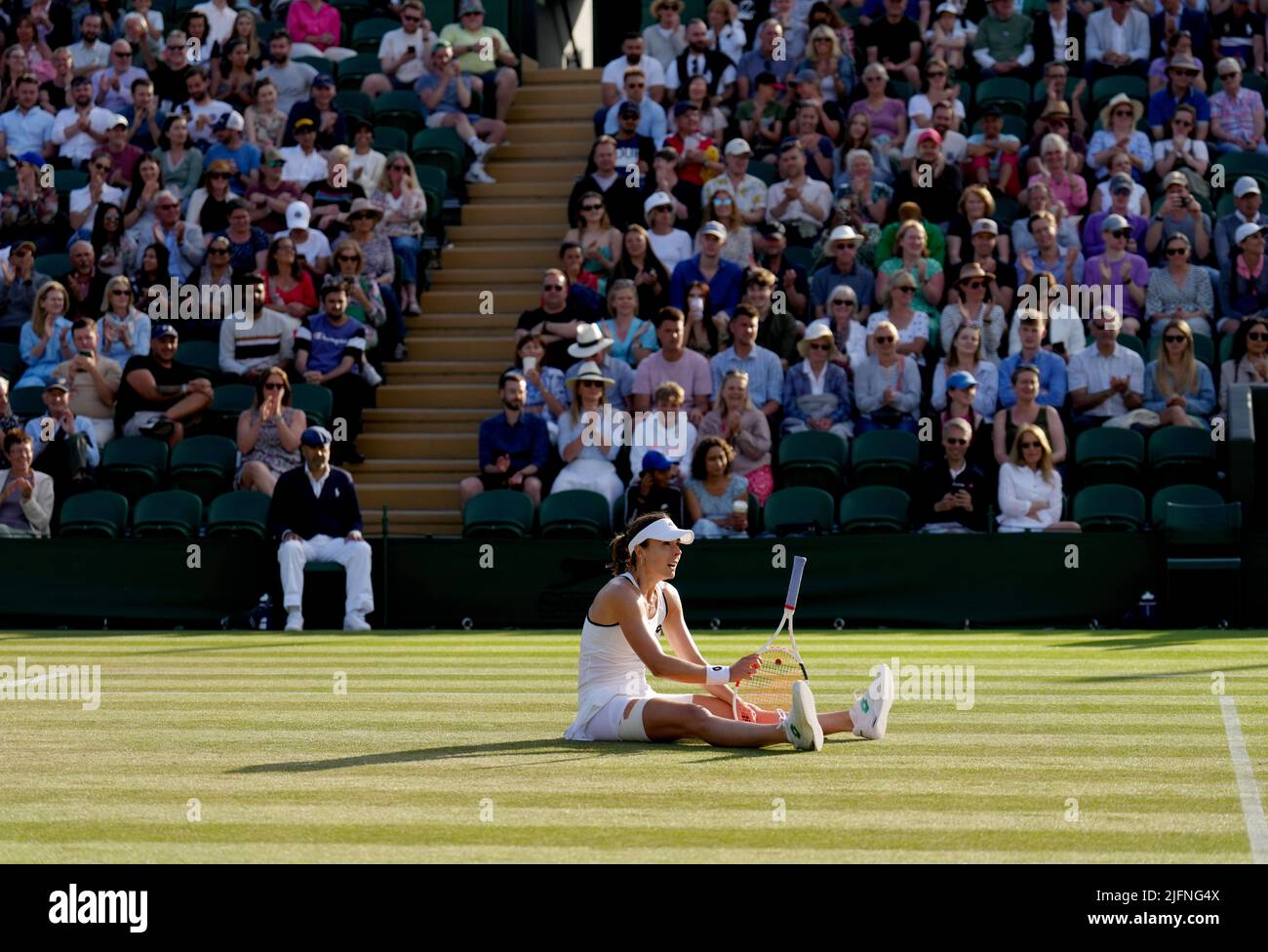 Alize reacts against Ajla Tomljanovic on day eight of the 2022
