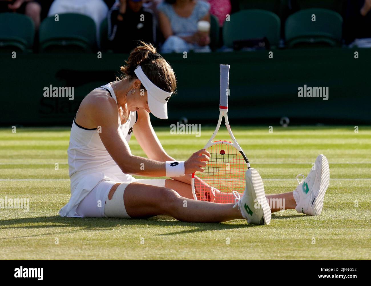 Alize reacts against Ajla Tomljanovic on day eight of the 2022
