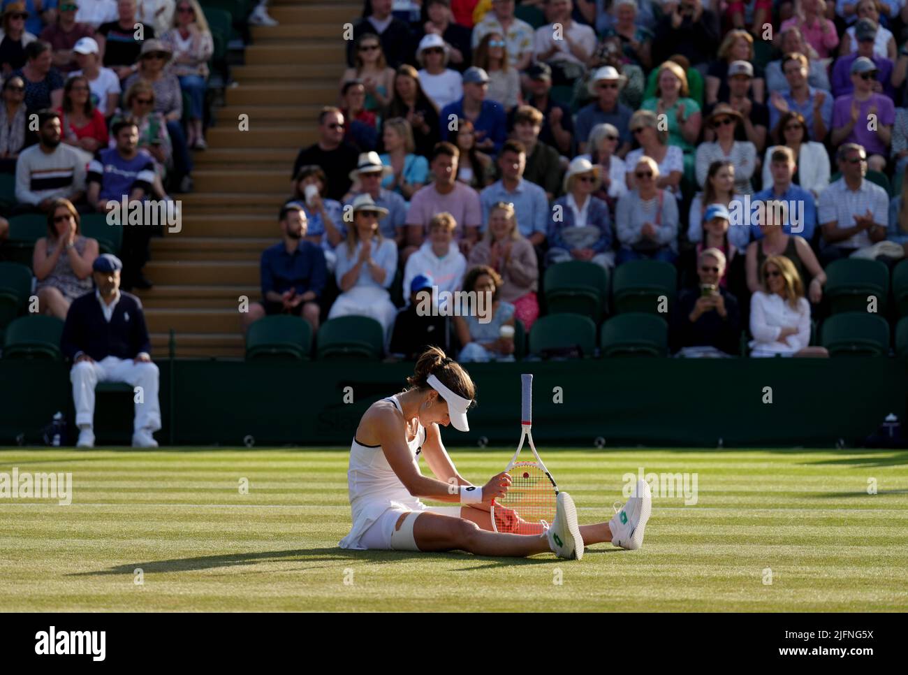 Alize reacts against Ajla Tomljanovic on day eight of the 2022