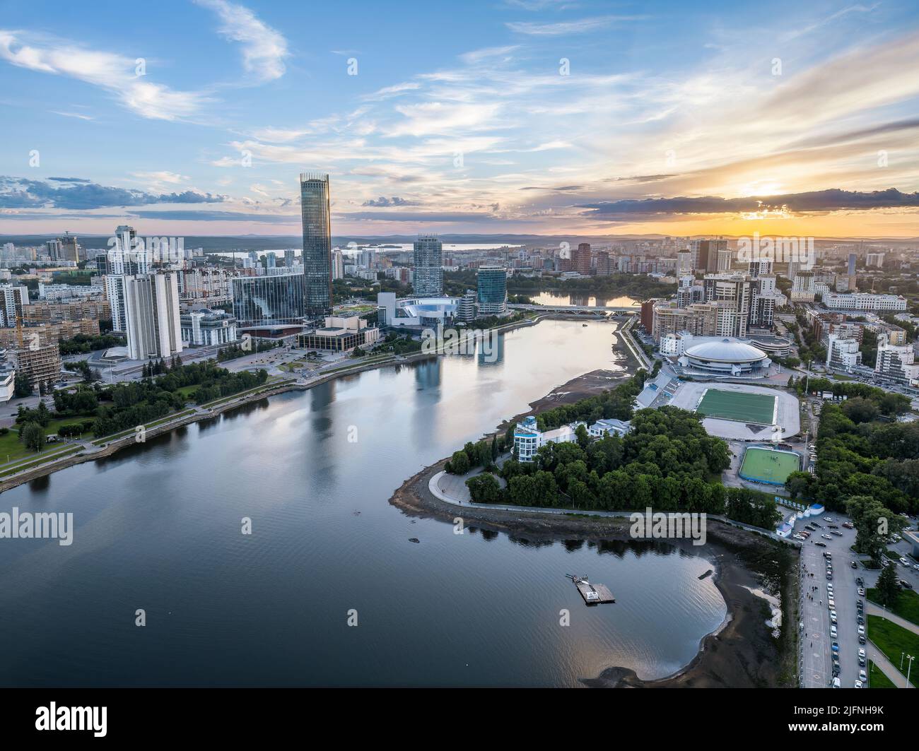 Yekaterinburg city and pond aerial panoramic view at summer sunset ...