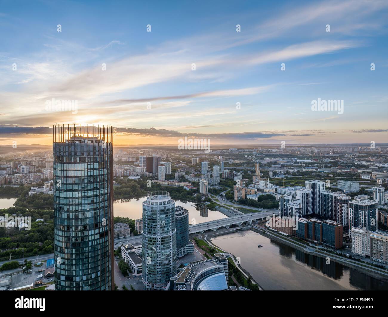 Yekaterinburg city and pond aerial panoramic view at summer sunset ...