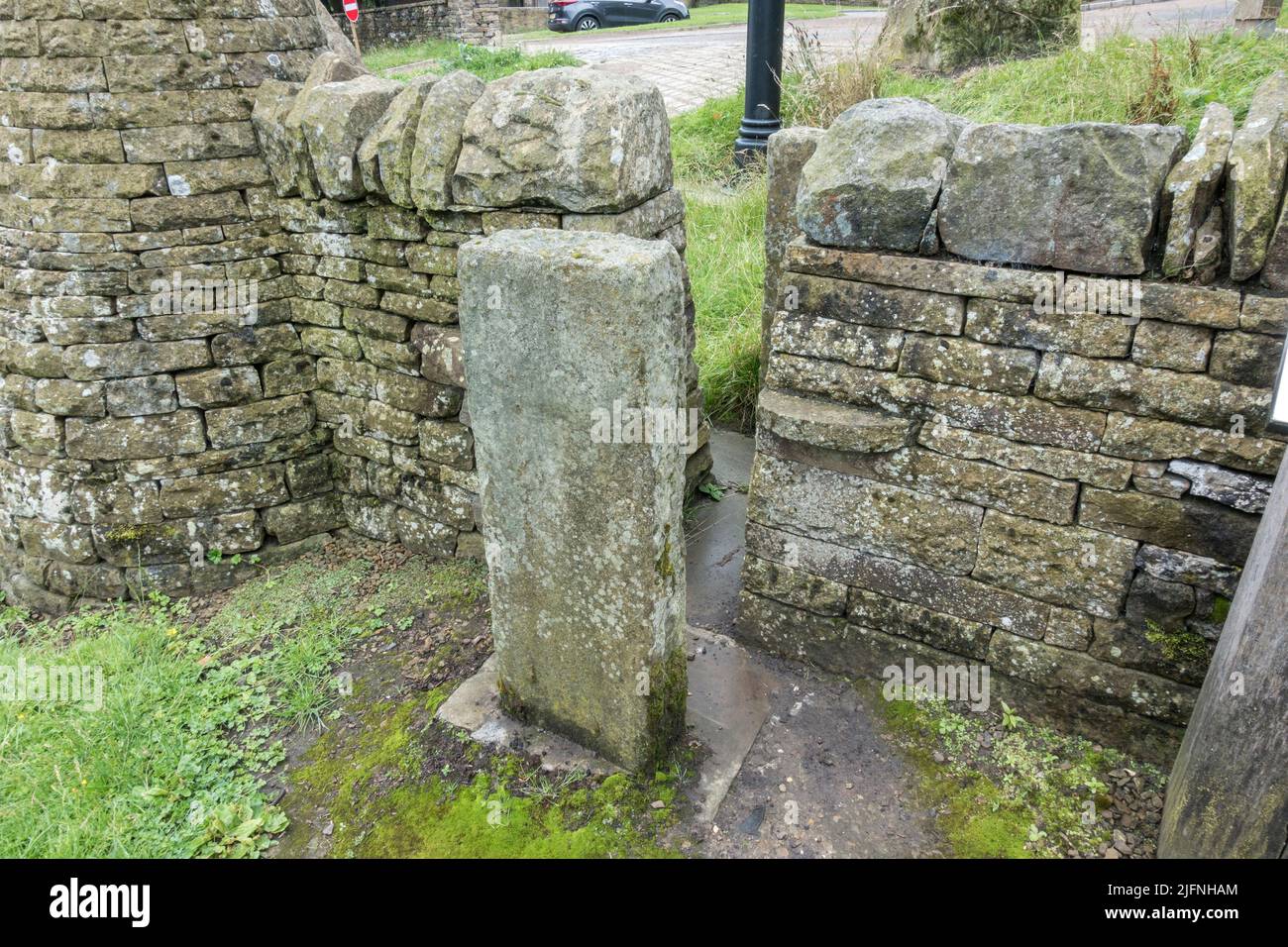 Example of a stump stile, part of a dry stone walling exhibit, Shibden Park, Halifax, Yorkshire, UK. Stock Photo