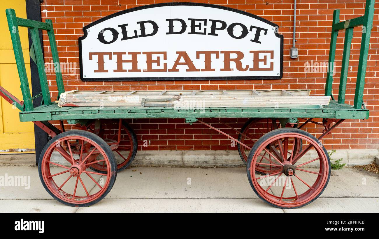 Antique wagon and Theatre sign in Dillon Montana Stock Photo Alamy
