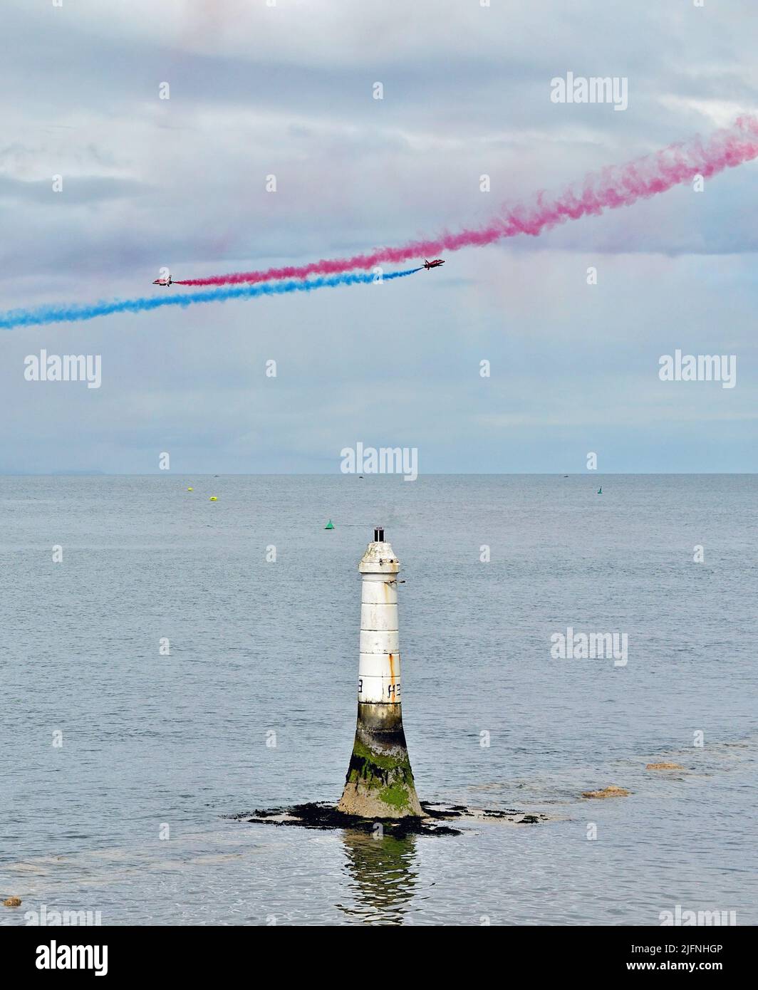 Two of the Red Arrows flying over the Phillip Lucette Beacon at Shaldon