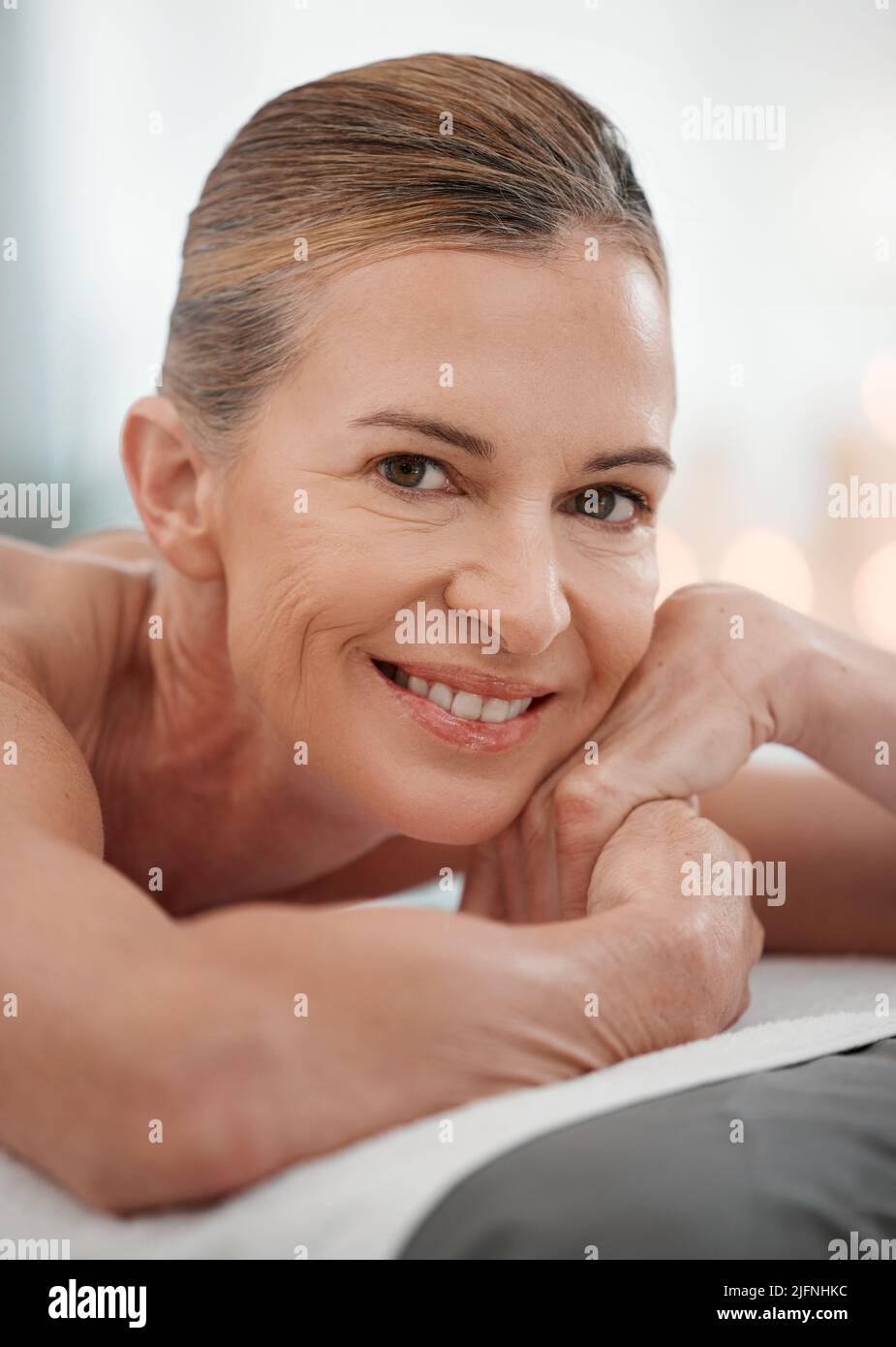 Never felt more relaxed than this. Shot of a mature woman resting in between spa treatments. Stock Photo