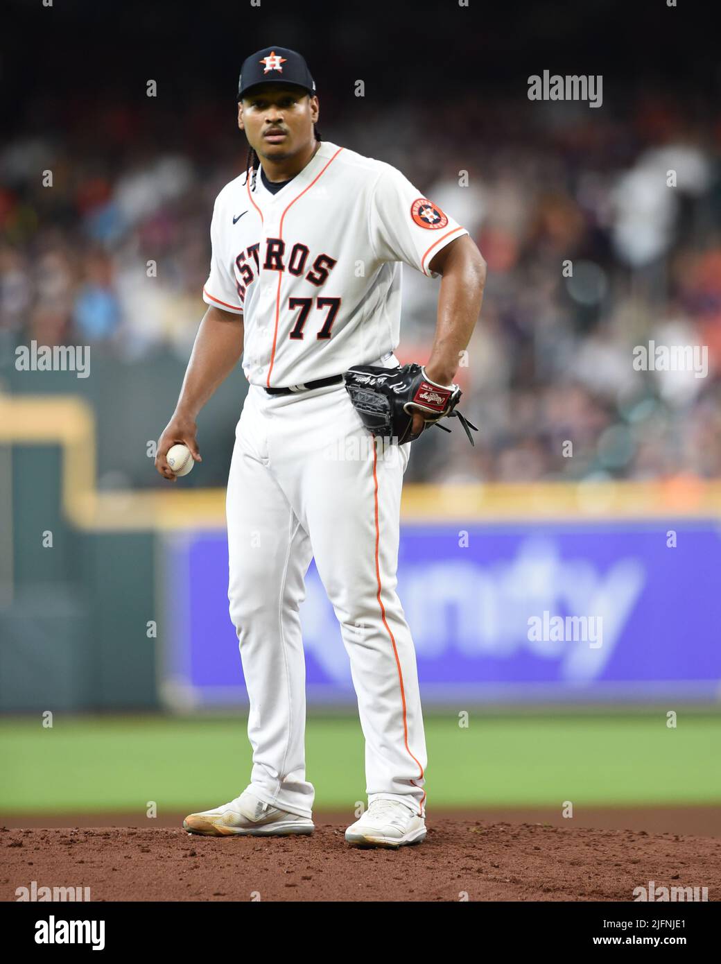Houston Astros starting pitcher Luis Garcia (77) pitches during the